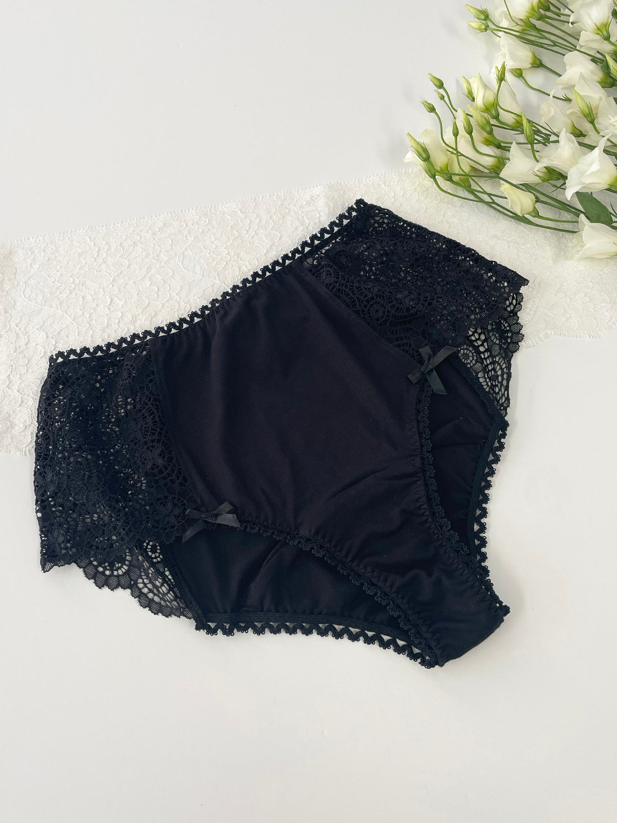 Sustainable black knicker crafted from organic bamboo jersey and soft lace