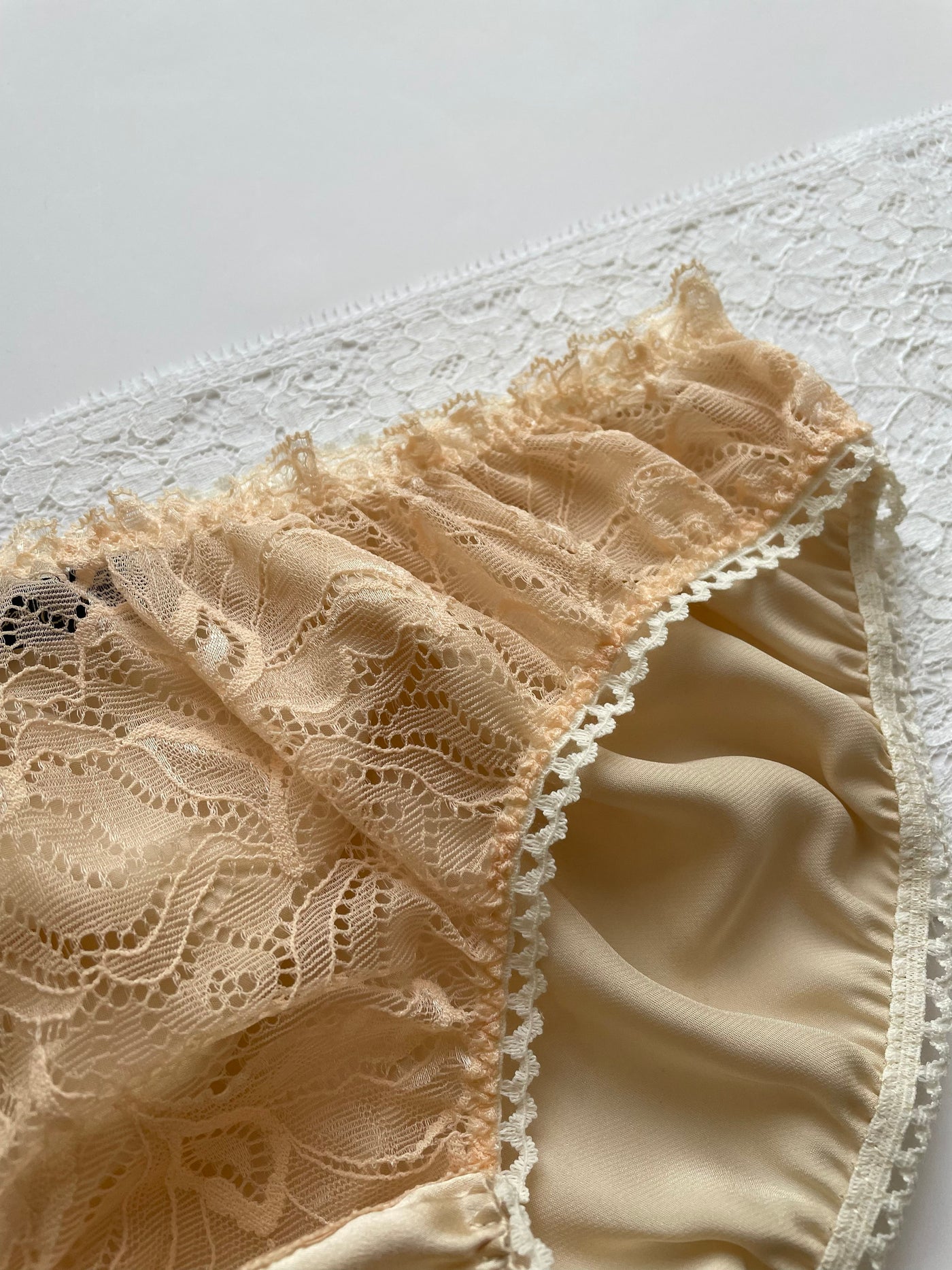 Luxurious peach silk knicker with eco-friendly lace for everyday comfort