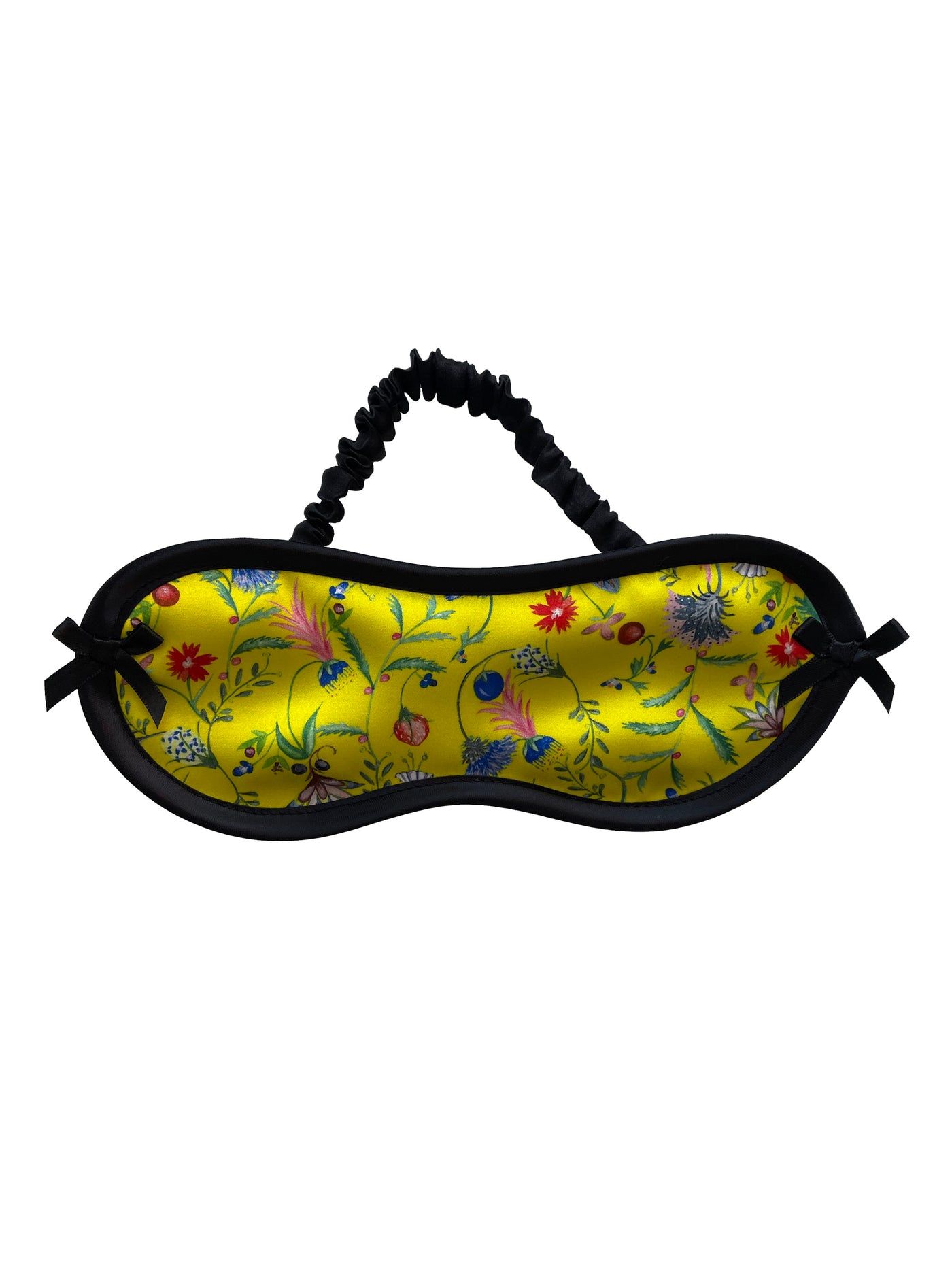 Luxury sleep mask in vibrant Liberty London floral silk with silk-covered elastic strap, lined with black silk for a peaceful night’s sleep