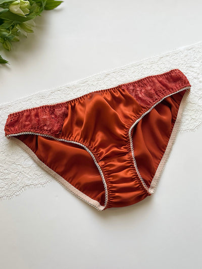 Luxurious terracotta silk and lace knicker made with sustainable materials.