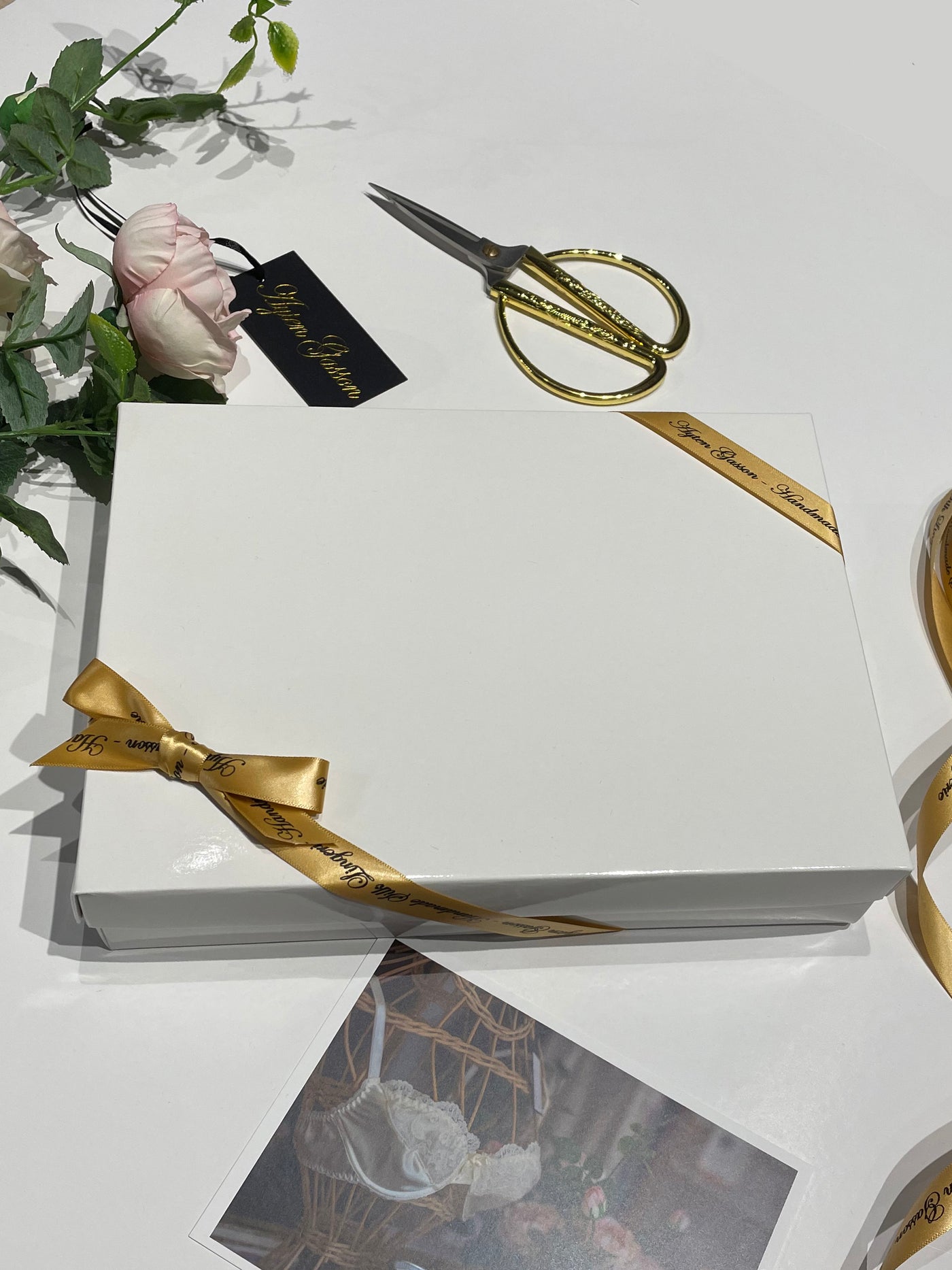 Luxurious Ayten Gasson gift wrap with satin ribbon and gold sticker, ideal for lingerie or nightwear.